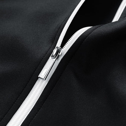 Close-up of a black jacket with a silver zipper