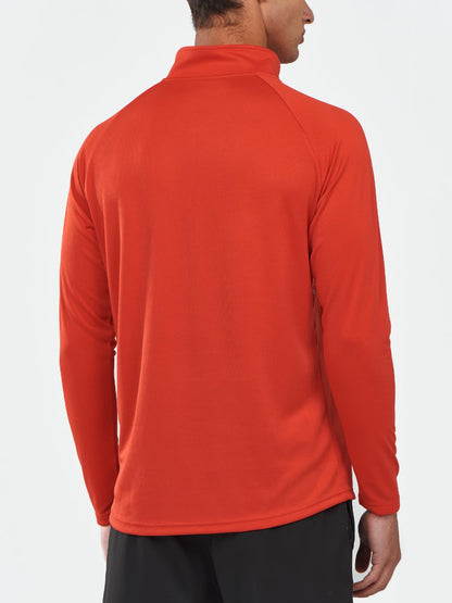 Person wearing an orange long-sleeve shirt 
