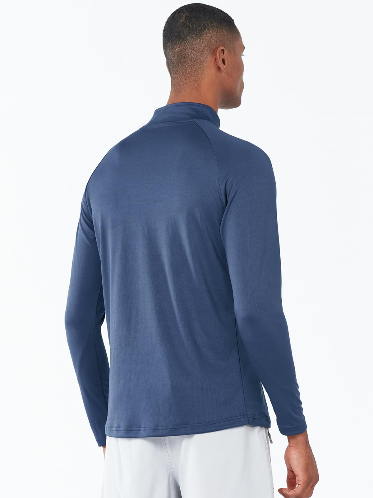 Man wearing a blue long-sleeve training tops